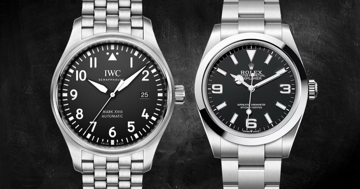 iwc-pilots-watch-vs-rolex-explorer-1 IWC Pilot's Watch and Rolex Explorer side by side on astainless steel bracelet, showcasing aviation and adventure watch designs.